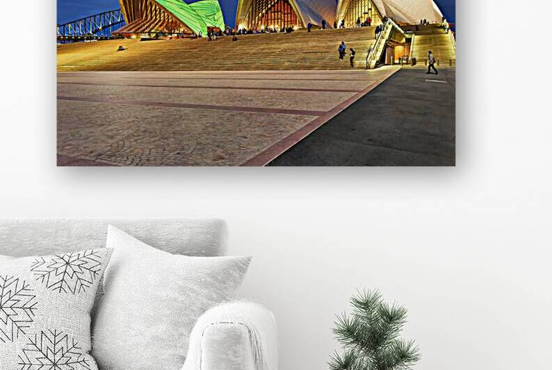 Sydney Opera House illuminated at dusk with people on steps. by Marco Brivio