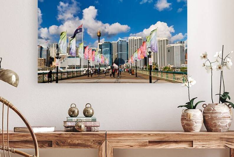 Sydney Harbour Bridge with flags and city skyline. by Marco Brivio