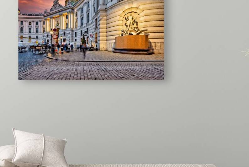 Hofburg Palace Vienna illuminated at dusk with festive street  by Marco Brivio