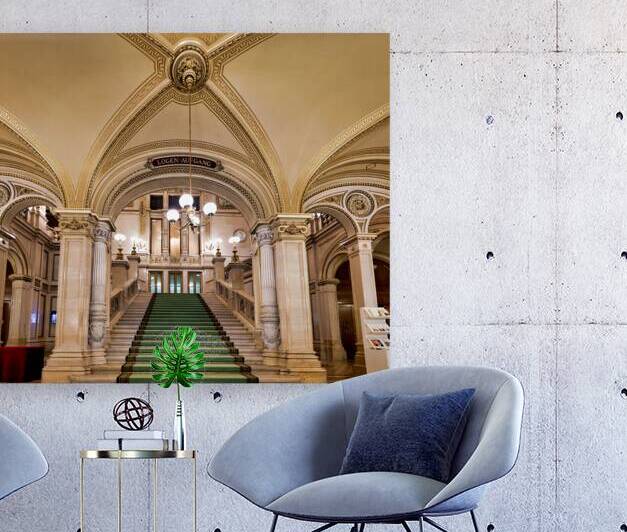 Majestic staircase with green carpet in an ornate hall. by Marco Brivio