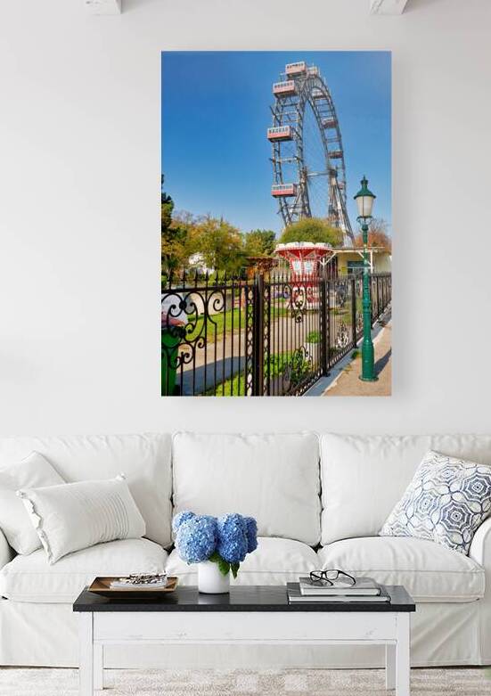 Prater Ferris wheel and carousel under a clear blue sky. by Marco Brivio
