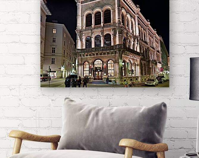 Viennas Cafe Central illuminated at night with police and peop by Marco Brivio