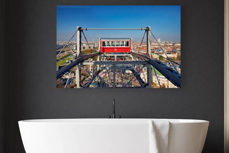 Ferris wheel cabin overlooking Vienna city skyline. by Marco Brivio