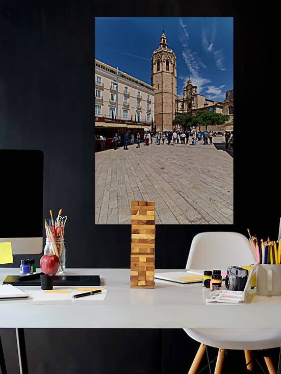 Valencia Cathedral tower stands tall in the plaza with many visi by Marco Brivio