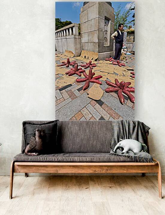 Red potatoes for sale in Tokyo near a bridge area by Marco Brivio