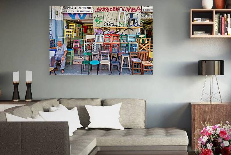 Flea market in Monastiraki shows colorful chairs for sale by Marco Brivio