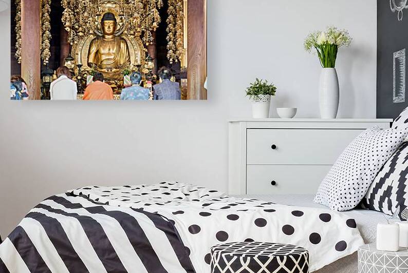 Buddha statue inside Chion in temple in Kyoto attracts many visi by Marco Brivio