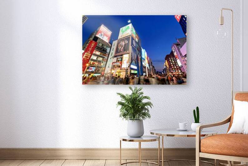 Dotonbori District in Osaka shows bright signs at sunset time by Marco Brivio