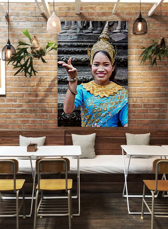 Smiling Cambodian dancer in traditional blue and gold costume. by Marco Brivio