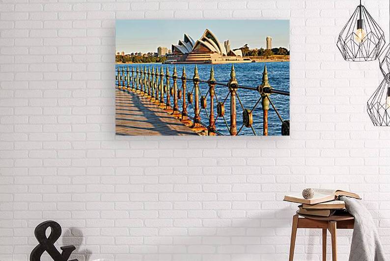 Sydney Opera House and harbor view at sunset. by Marco Brivio