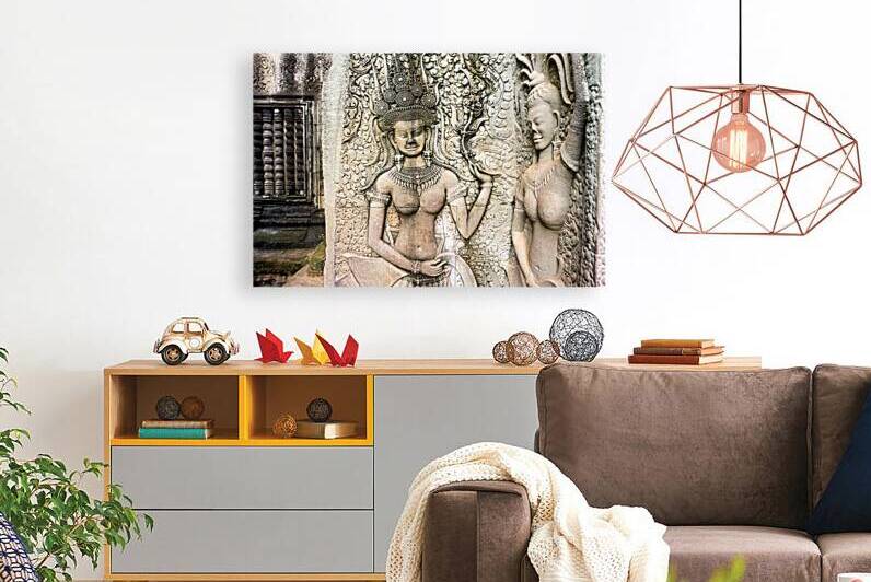 Angkor Wat temple wall with detailed Apsara stone carvings. by Marco Brivio