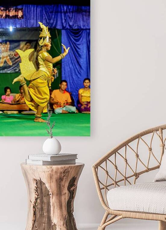 Girl performs traditional Cambodian dance in golden costume. by Marco Brivio