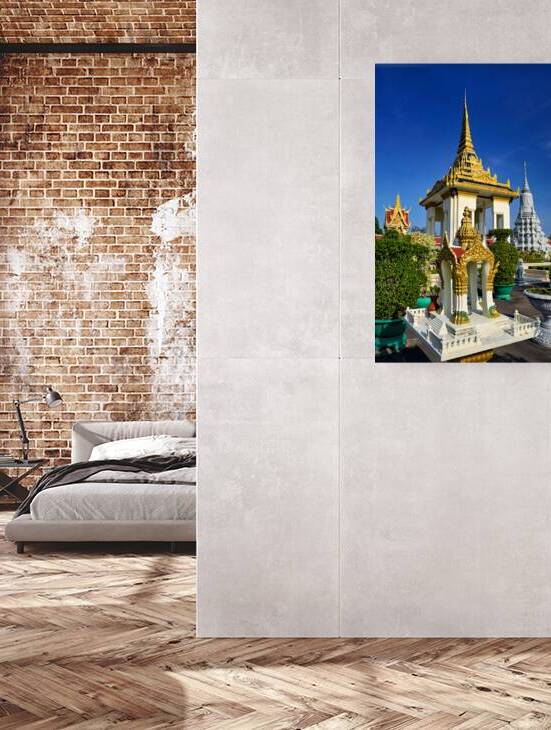 Golden temples and a grey stupa under a clear blue sky. by Marco Brivio