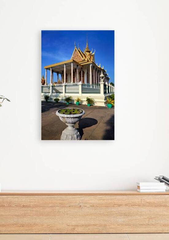 Golden roofed Cambodian palace with water lily pot. by Marco Brivio