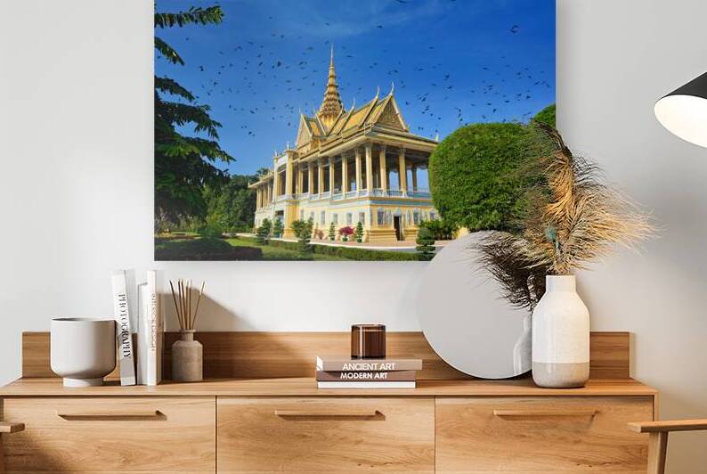 Majestic golden temple birds soaring in clear blue sky. by Marco Brivio