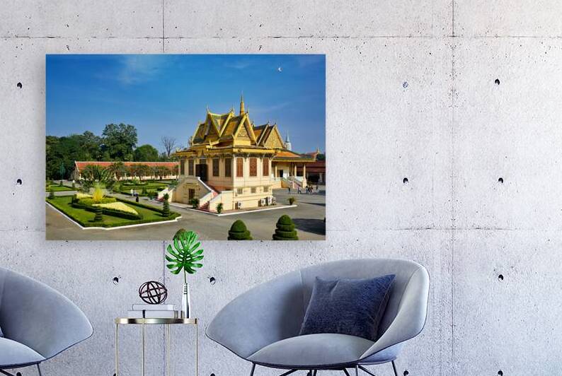 Golden roofed Cambodian palace manicured gardens and clear blu by Marco Brivio