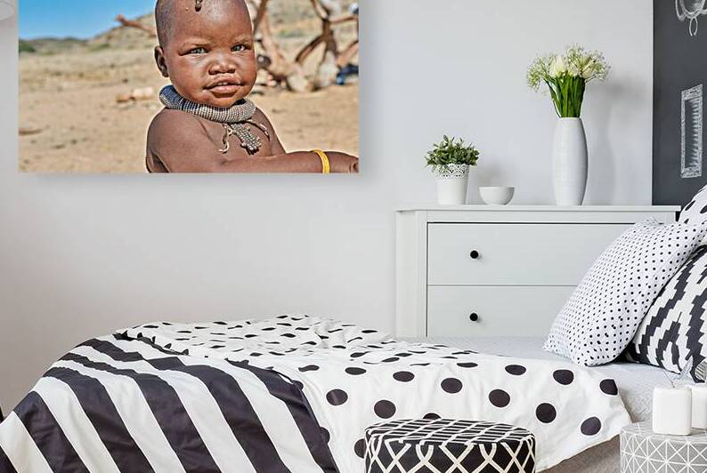 Portrait of Himba child in Kunene region of Namibia by Marco Brivio