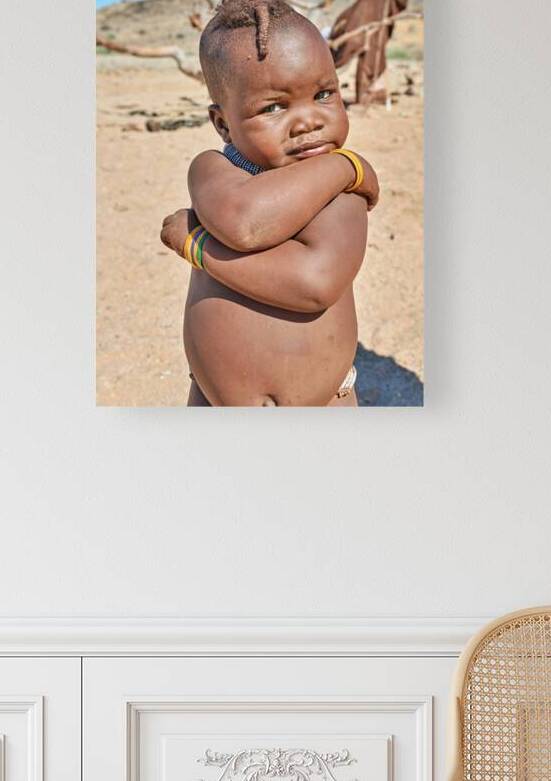 Portrait of a Himba child in the Kunene region of Namibia by Marco Brivio