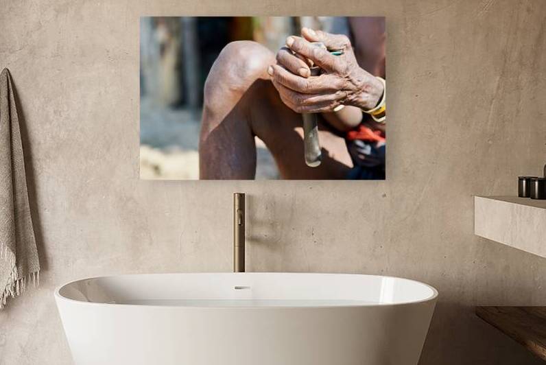 Hands of an old woman from the Zemba Bantu ethnic group in Namib by Marco Brivio