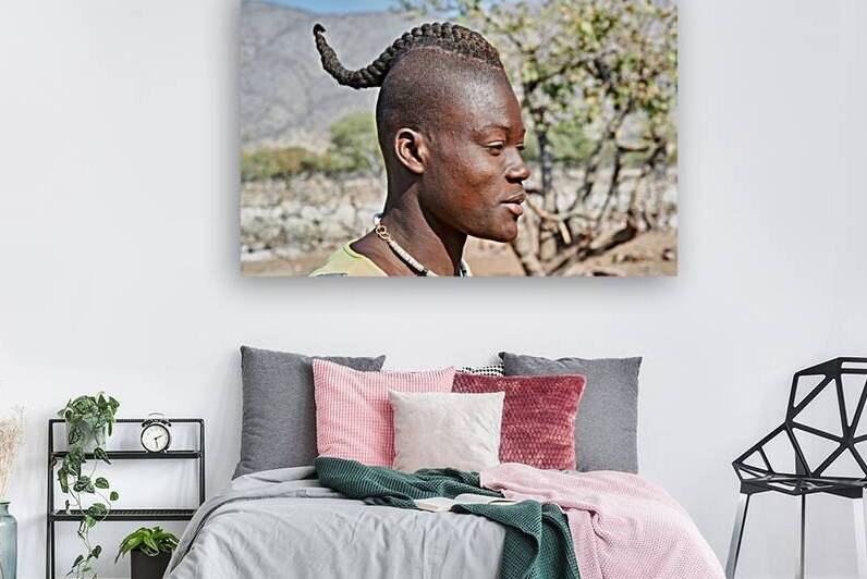 Young man with traditional hair headdress in Himba Village in Na by Marco Brivio