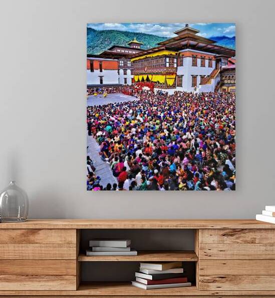 Large crowd at a traditional Bhutanese festival. by Marco Brivio