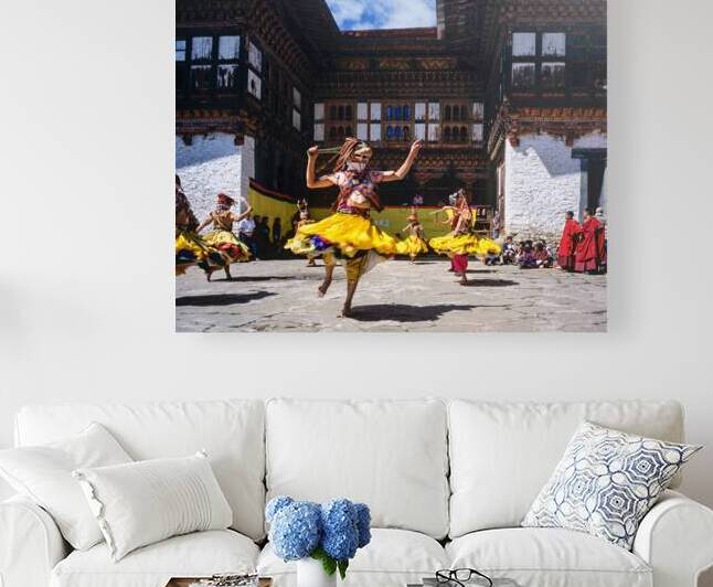 Bhutanese masked dancers perform traditional dance at a monaster by Marco Brivio