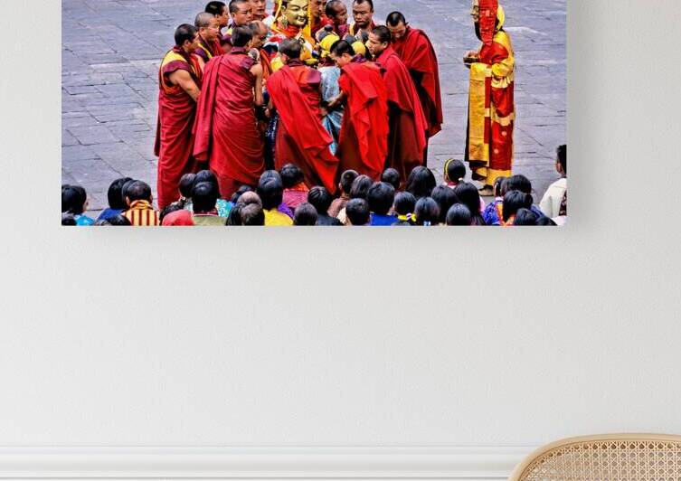 Monks in red robes gathered around a golden statue. by Marco Brivio