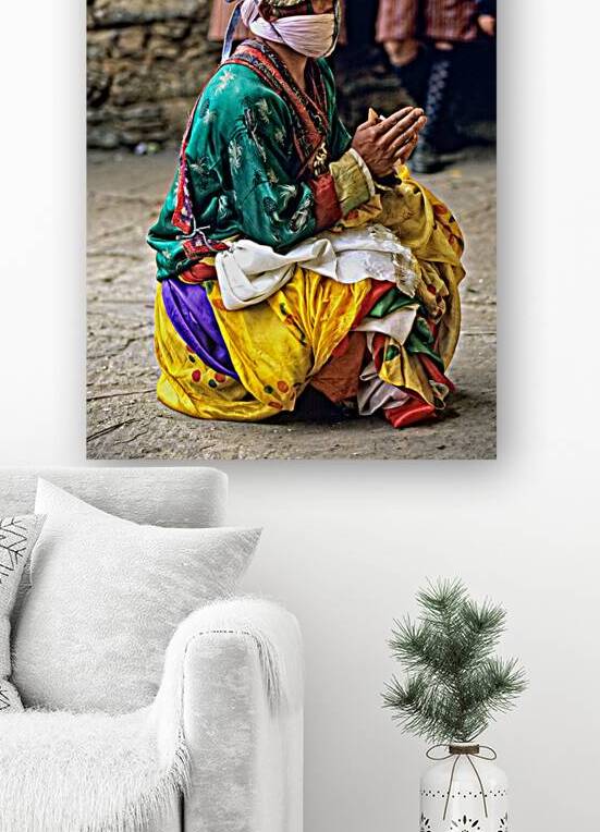 Traditional Bhutanese dancer in animal mask and colorful costume by Marco Brivio