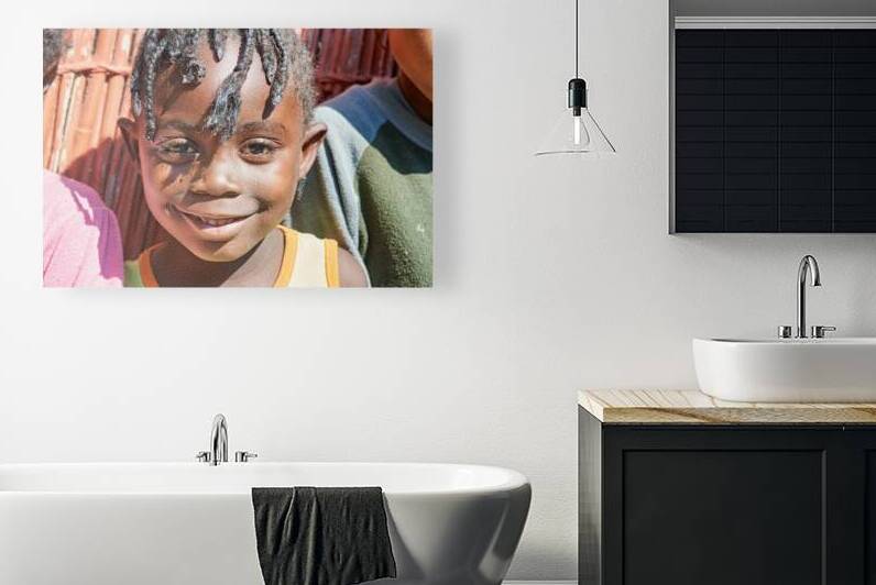 Joyful child in Kavango Region of Namibia by Marco Brivio