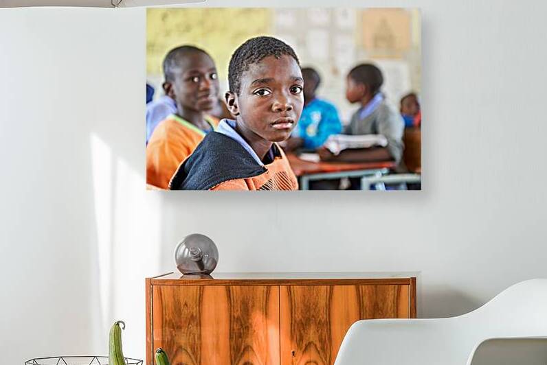 Student at desk in classroom in Rundu Kavango Region Namibia by Marco Brivio