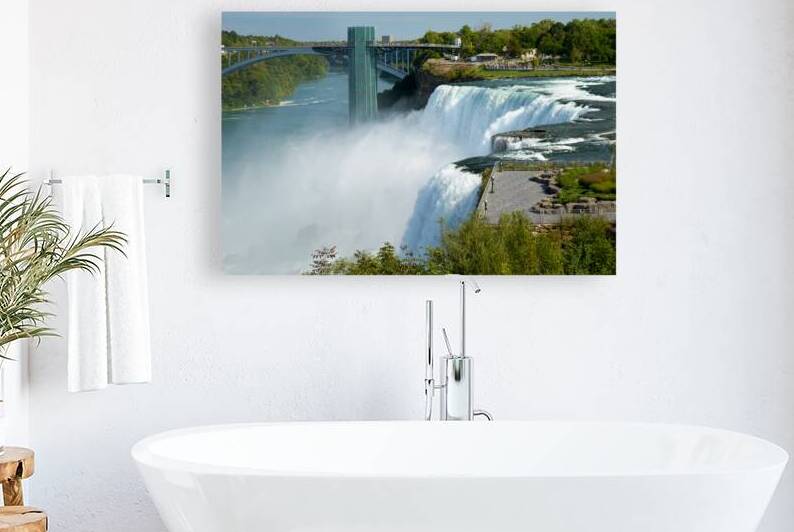 Niagara Falls bridge and observation deck on a sunny day. by Marco Brivio