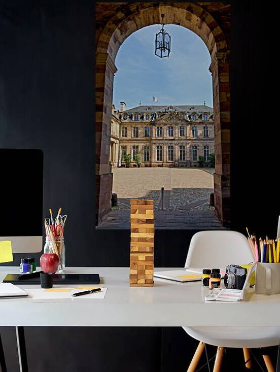 View of Palais Rohan from archway in Strasbourg Alsace France by Marco Brivio