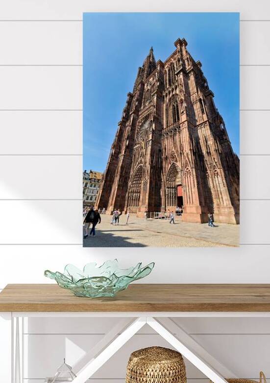 Strasbourg Cathedral stands tall in Alsace square on a sunny day by Marco Brivio