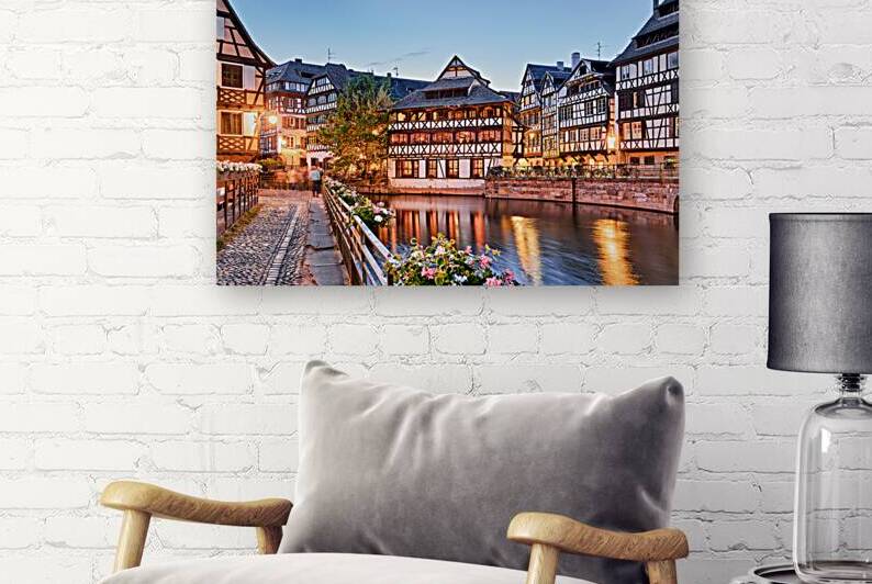 Evening in Petit France with timber framed houses by water by Marco Brivio