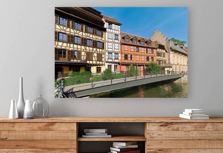 Visitors enjoy Petit France in Strasbourg with timber framed hou by Marco Brivio