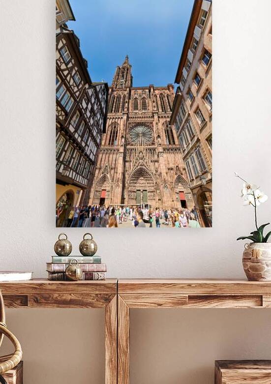 Tourists gather at Strasbourg Cathedral in Alsace on a sunny day by Marco Brivio