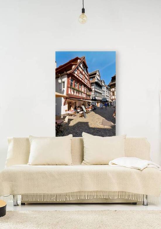 Colorful timber houses in Petit France with food loving visitors by Marco Brivio