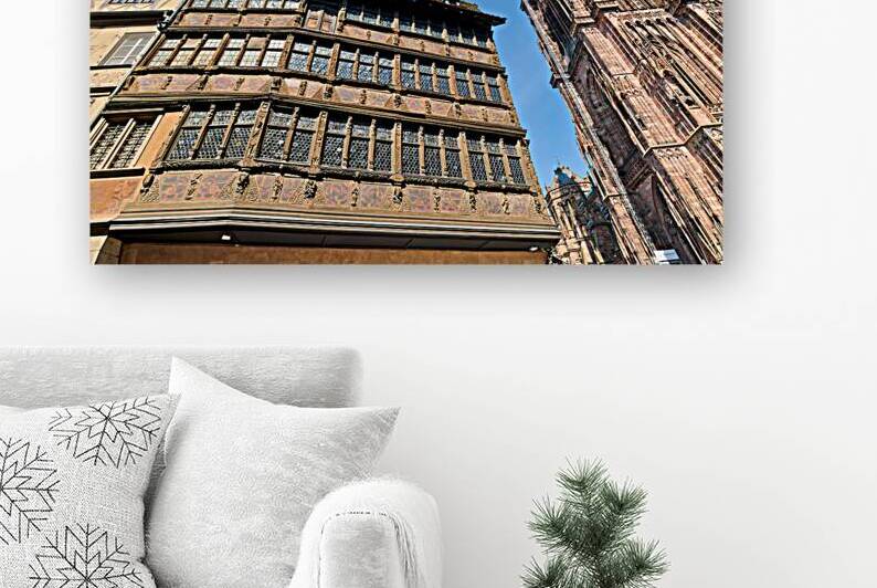 Visitors walk by Kammerzell House and Cathedral in Strasbourg by Marco Brivio