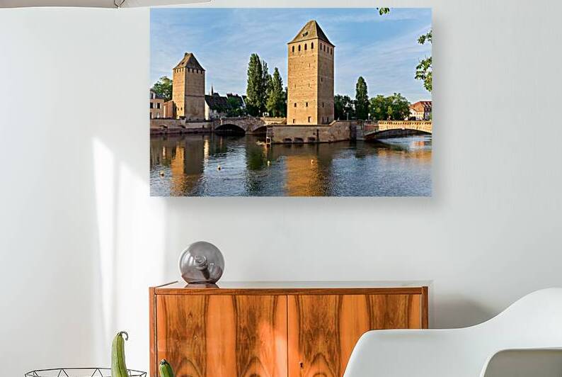 Exploring covered bridges in Strasbourg on a clear day by Marco Brivio