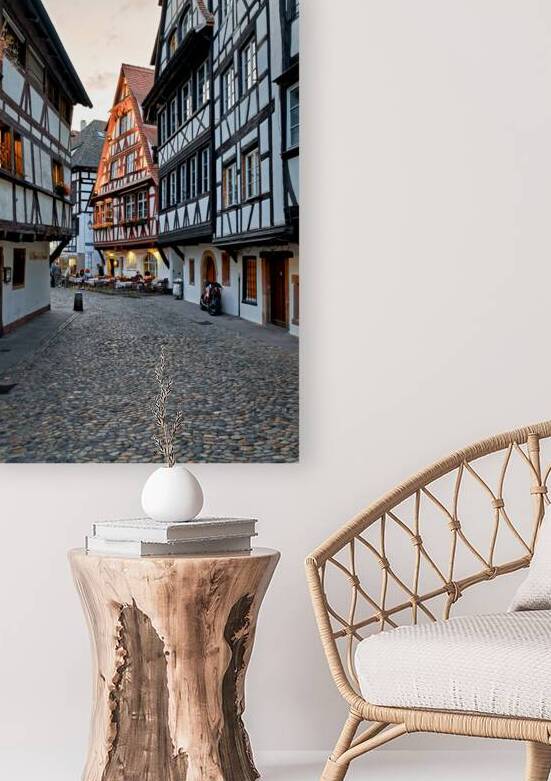 Gathering at outdoor tables in Petit France Strasbourg at sunse by Marco Brivio