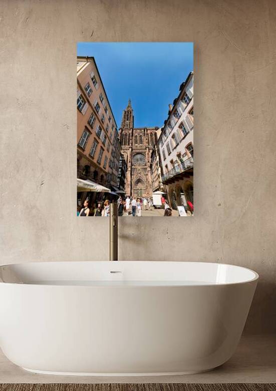 Visitors stroll by the Cathedral in sunny Strasbourg by Marco Brivio