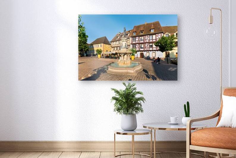 Visitors enjoy warm day at fountain in Petite Venise Colmar by Marco Brivio