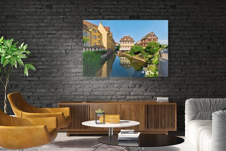 Visitors enjoy sunny day by canals in Colmar France by Marco Brivio