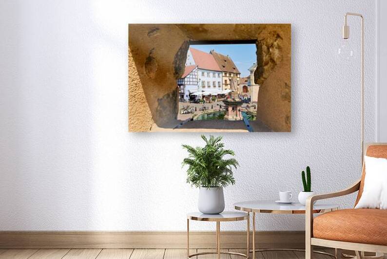 Visitors enjoy Saint Leon square in Eguisheim Alsace on wine rou by Marco Brivio
