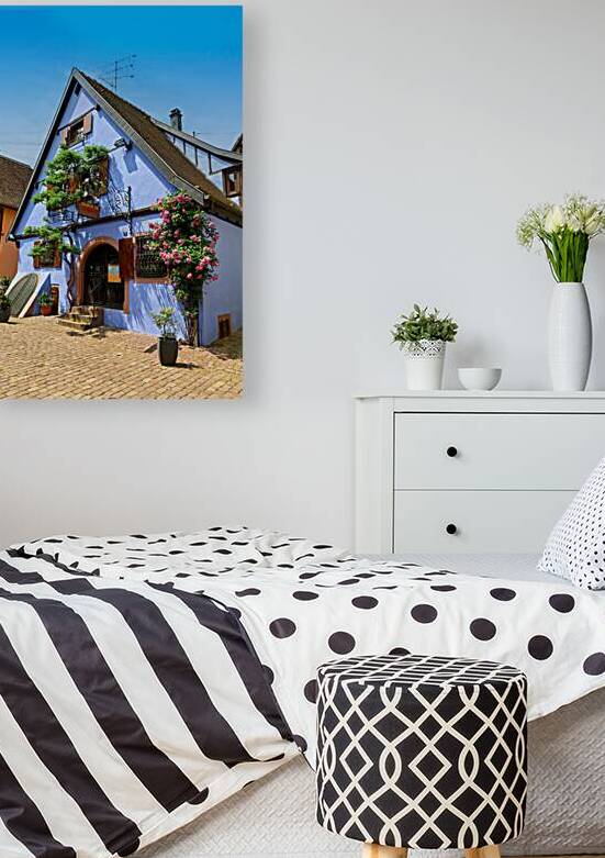 Visit Riquewihr in Alsace with colorful houses and blooming flow by Marco Brivio