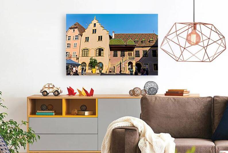 Visitors gather at Koifhus old custom house in Colmar Alsace by Marco Brivio