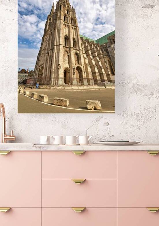 Chartres Cathedral stands tall in Chartres France under a blue s by Marco Brivio