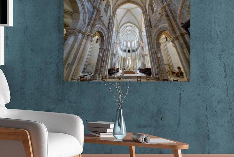 Vezelay Abbey in Bourgogne features tall arches and stone walls by Marco Brivio