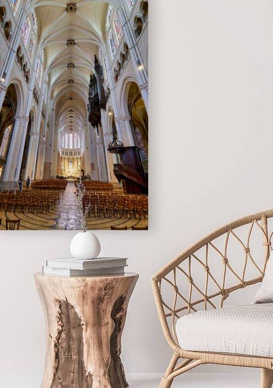 Chartres Cathedral inside with tall arches and wooden chairs by Marco Brivio