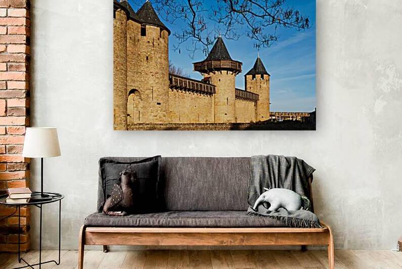 Historic fortress towers in Carcassonne France under clear sky by Marco Brivio